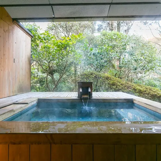 A private onsen bath in a ryokan suite