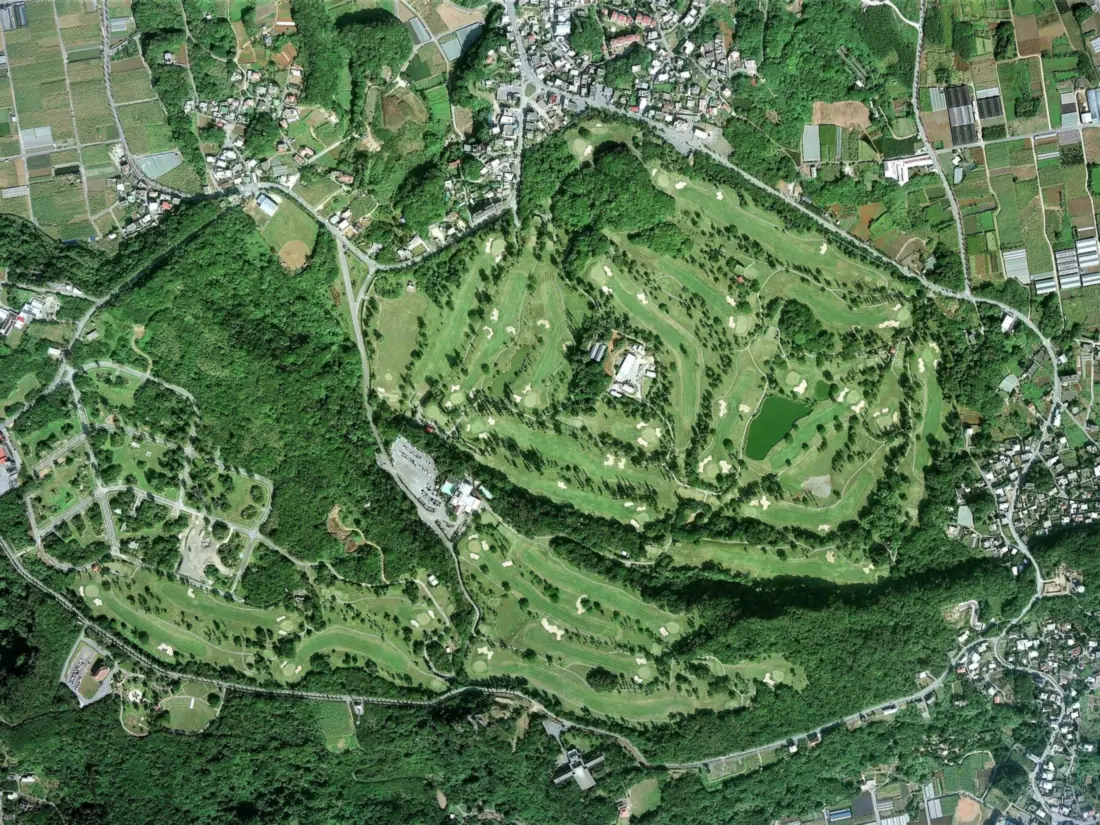 Aerial survey photograph of Ryukyu Golf Club on the hills above Nanjo, southern Okinawa
